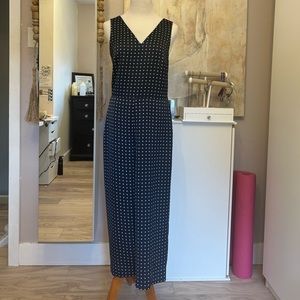 Banana Republic Navy Polka Dot Jumpsuit with Twist back detail.